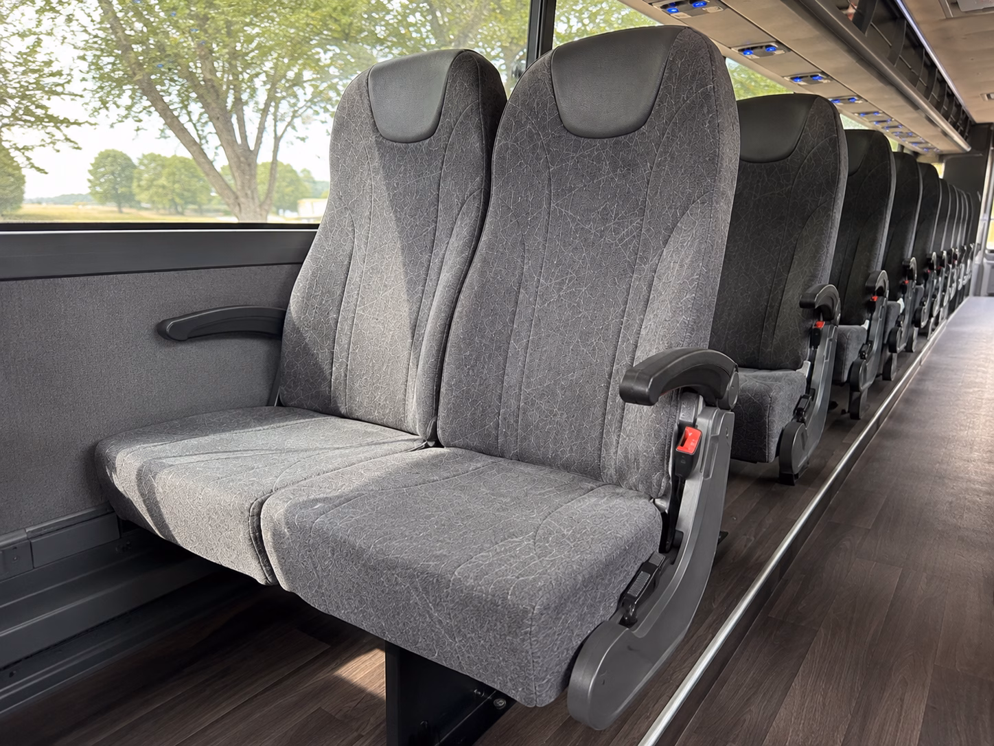 how starting location and deadhead affect charter bus rates in farmington hills michigan